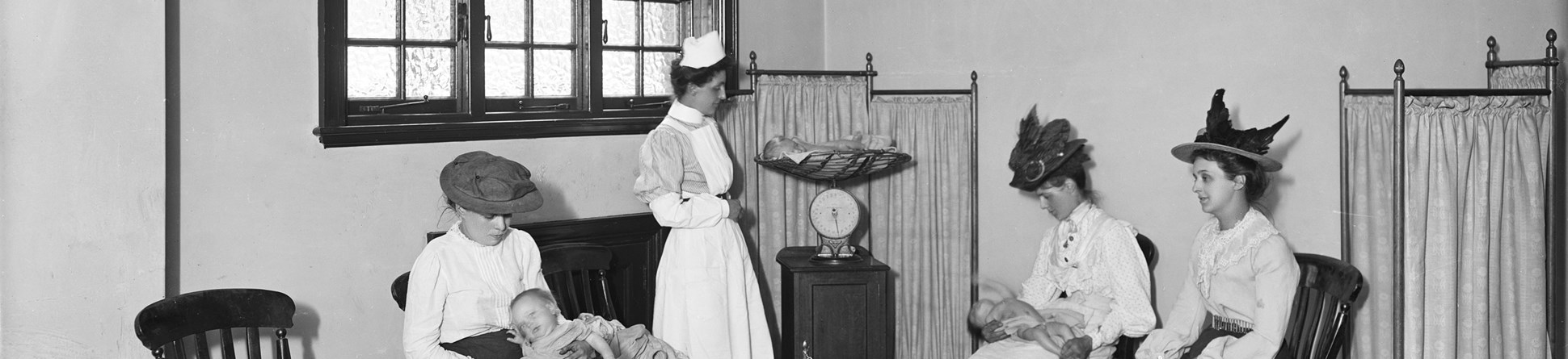 Babies being weighed in the reception room of an infants hospital in 1908.