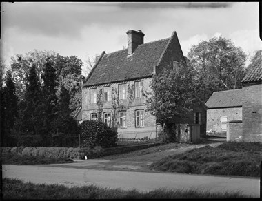 Archive photograph of vernacular buildings.