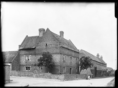 Archive photograph of vernacular buildings.